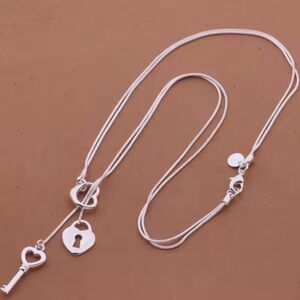Unlock my heart charm necklace with heart, lock and key in 925